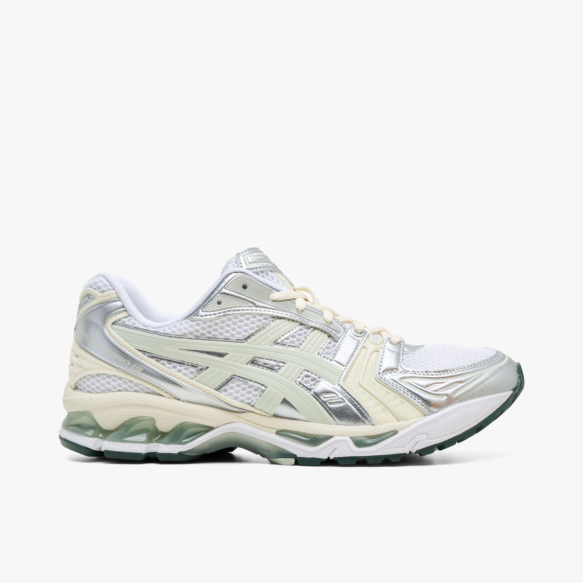 ASICS GEL-KAYANO 14. Side view of technical retro running sneakers featuring a white open mesh upper, metallic silver and light sage synthetic overlays, light sage Tiger Stripes, GEL-KAYANO 14 text branding on the lateral heel, white foam midsole with visible green GEL cushioning units, and a dark sage green rubber outsole. 