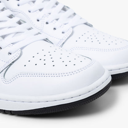 Jordan 1 Low Blanc / Noir - Blanc