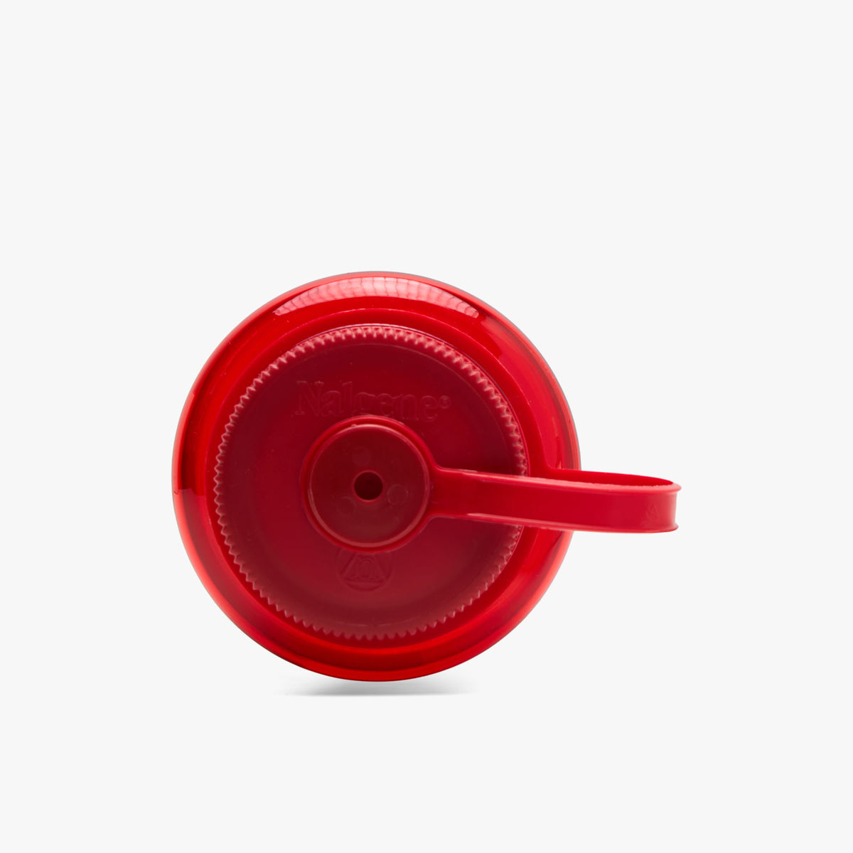 by Parra Water Slapped Nalgene Bottle. Overhead view showing the red threaded screw-top cap and attached retaining loop strap on the transparent red bottle. 