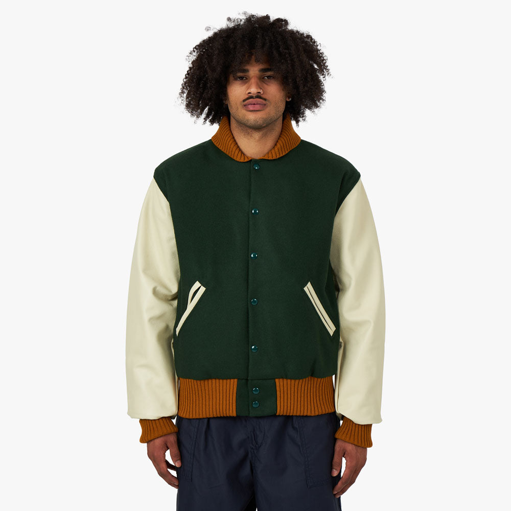 https://www.deadstock.ca/cdn/shop/files/AL003-24580007_engineered_garments_varsity_jacket__olive_wool_melton_C.jpg?v=1694070278
