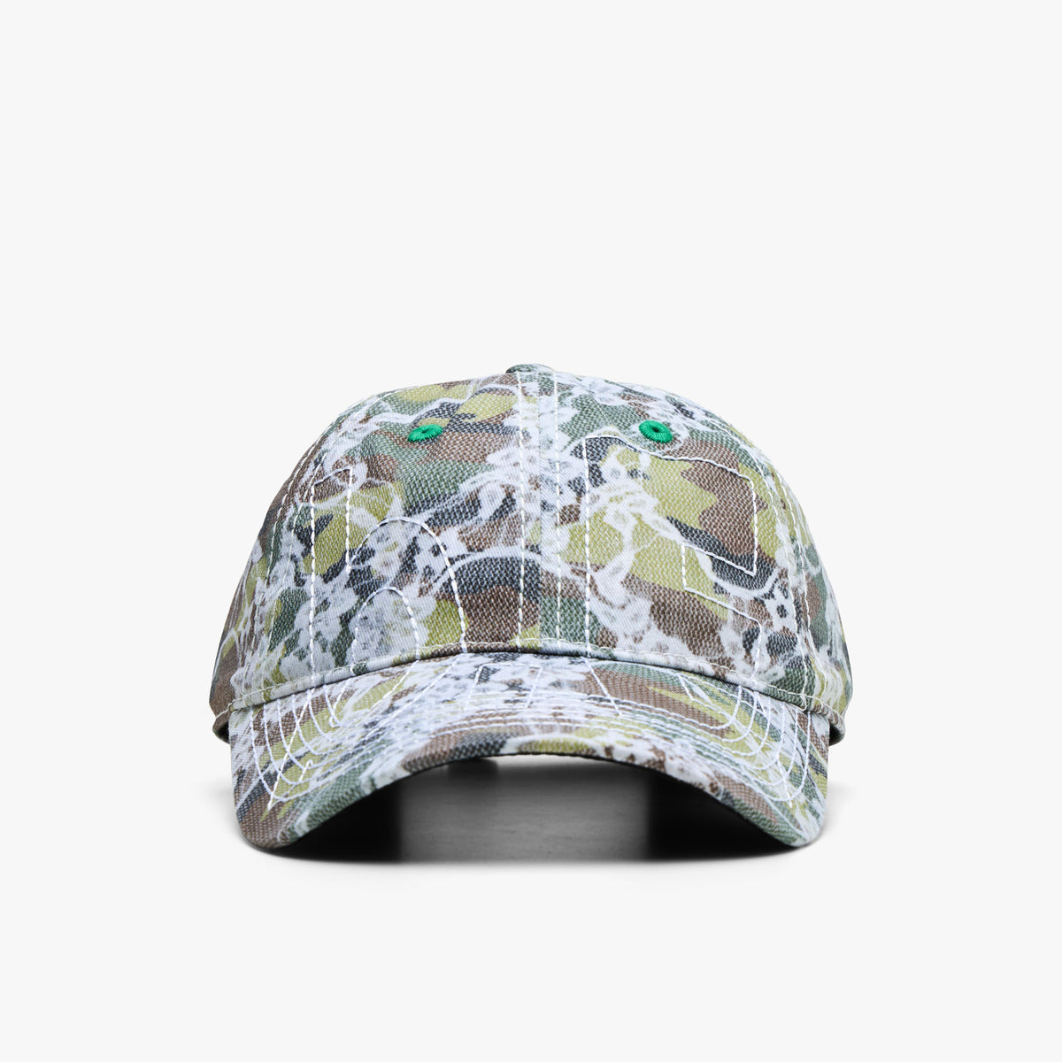 A baseball cap featuring a camouflage pattern overlaid with a white abstract floral design, shown against a plain white background.