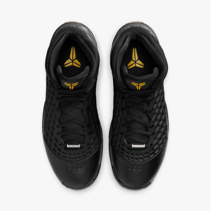 Nike Kobe III Protro. Overhead top-down view of pair of high-top basketball shoes showing black diamond net uppers, silver lace dubraes, black laces, and yellow Kobe Sheath branding on the insoles. 