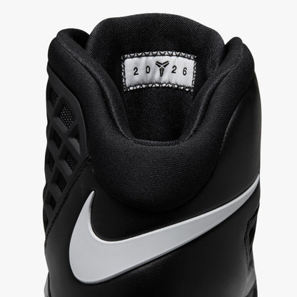 Nike Kobe III Protro. Close-up rear view of the ankle collar showing padded black lining, white Swoosh logo wrap, and interior tongue tag featuring Kobe graphics. 