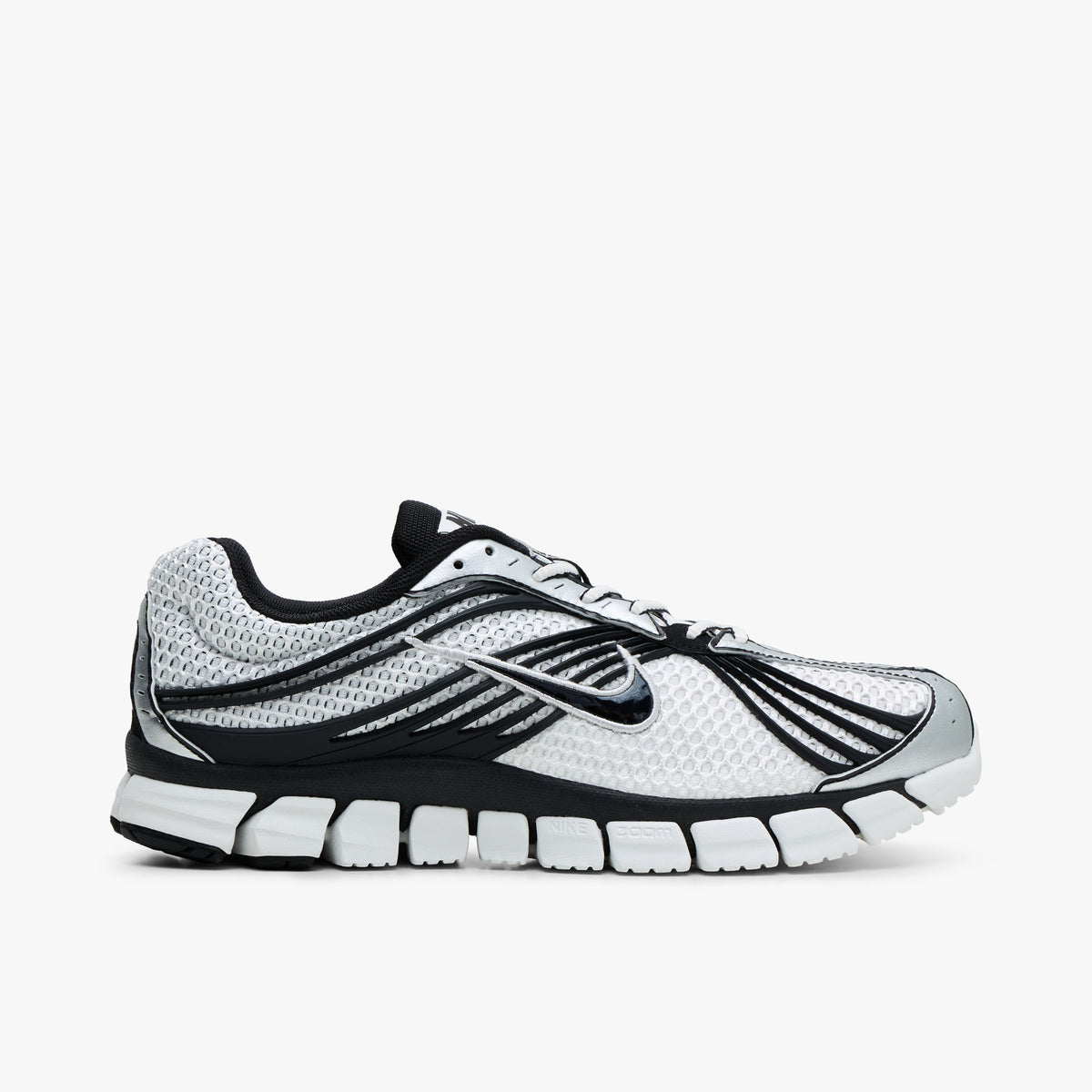 Side Nike Zoom Skylon 11. Side view of Summit White mesh running shoes with Black cage overlays, Nike Swoosh on the sidewall, and segmented midsole. 