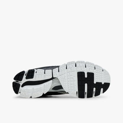 Nike Zoom Skylon 11. Bottom view of Summit White running shoes showing Black and White segmented rubber traction outsole. 