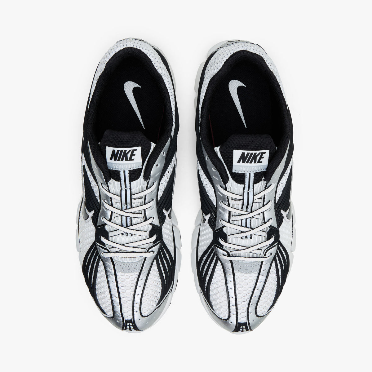 Nike Zoom Skylon 11. Top view of pair of Summit White running shoes showing Black collar lining, textile lining, white laces, and Nike tongue branding. 