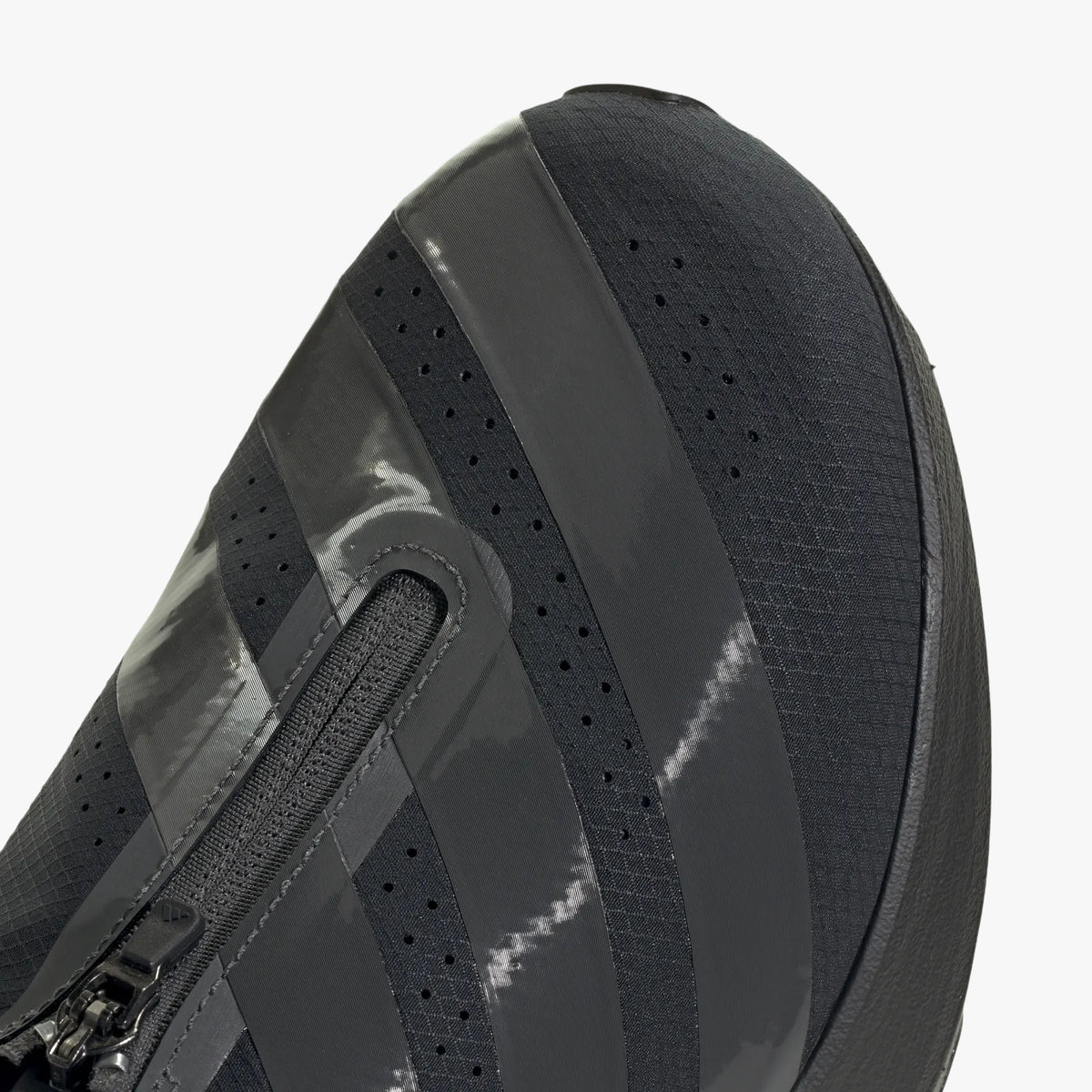 adidas adizero EVO SL Zip-Up. Close-up of Black mesh upper showing zipper closure, Grey three-stripes, and perforated ventilation. 
