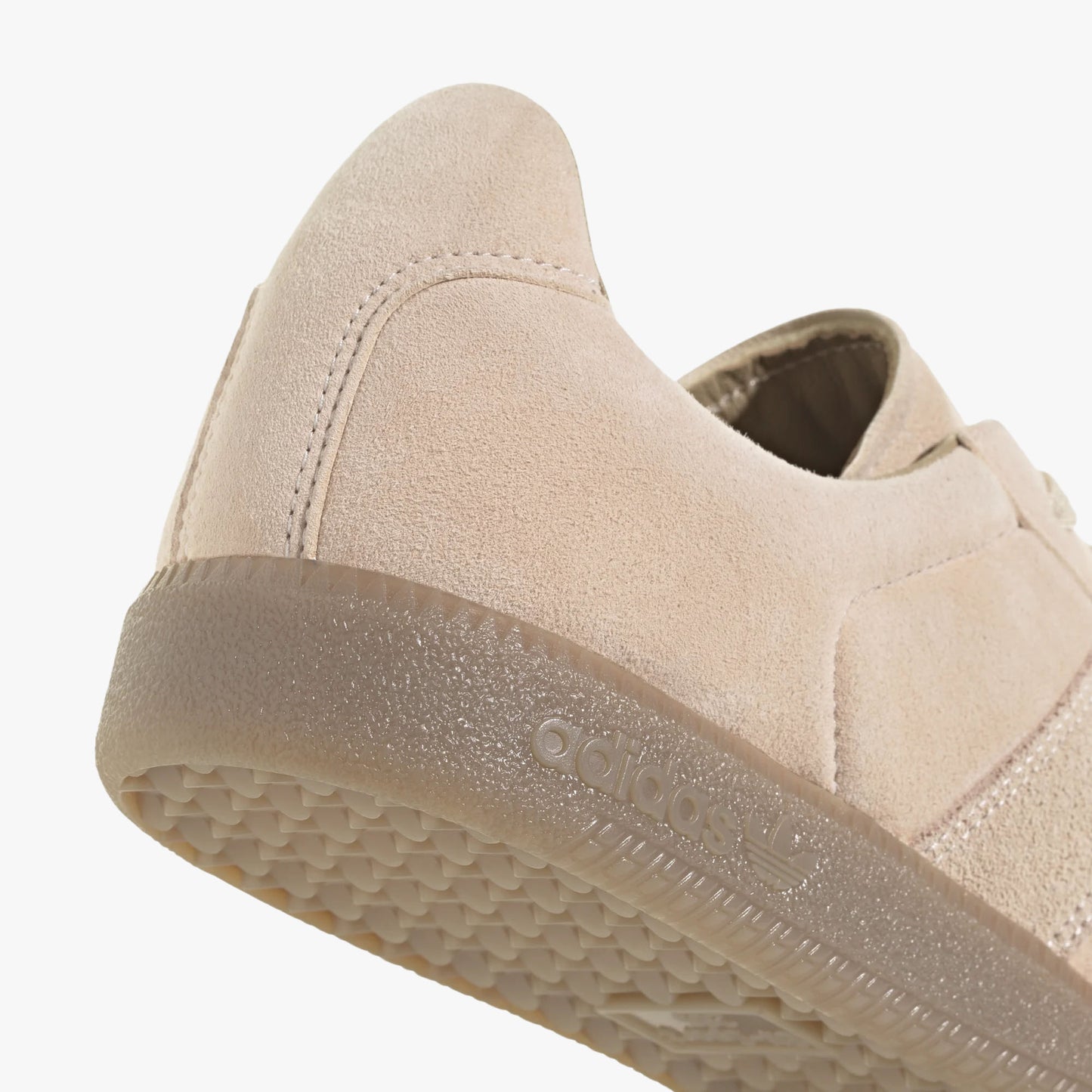 adidas BW Army. Close-up of Halo Blush nubuck heel overlay and textured Gum rubber cupsole with adidas branding. 