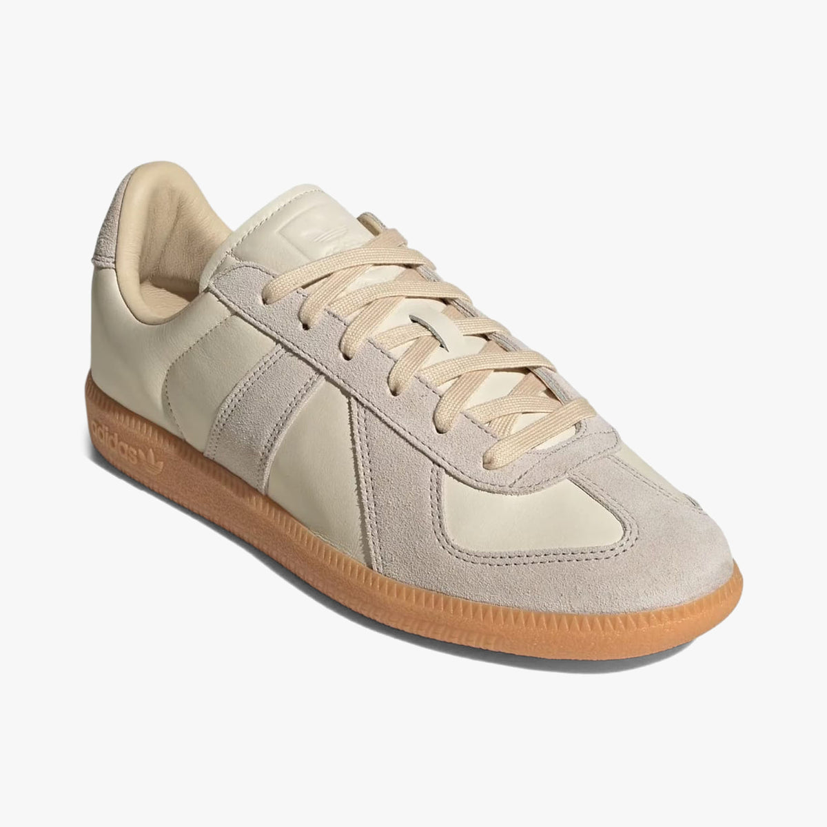adidas BW Army. Three-quarter view of Chalk White leather sneakers showing Clear Granite T-toe overlay and matching laces. 