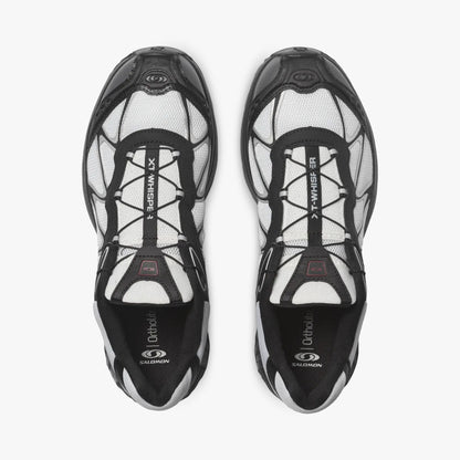 Salomon XT-WHISPER. Top-down overhead view of a pair of sneakers displaying white vamps, black overlays, black Quicklace lacing systems with lace pockets, and branded insoles. 