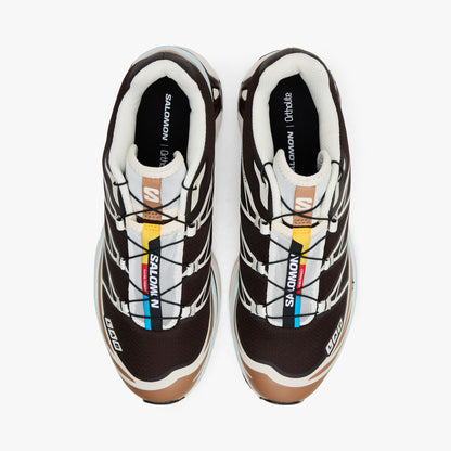Salomon XT-6 GTX. Top view of Black Coffee coloured trail running shoes showing Quicklace system, lace shroud, and colorful tongue accent strip. 