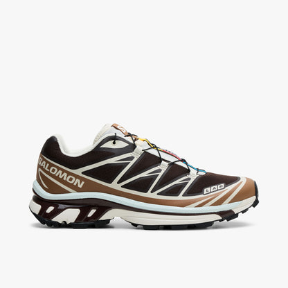 Salomon XT-6 GTX. Side view of Black Coffee coloured trail running shoes with Burro overlays, white Salomon branding, and lugged sole. 