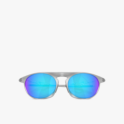 Oakley Neo Jacket. Straight-on front view of satin chrome sunglasses with bright blue mirrored lenses. 