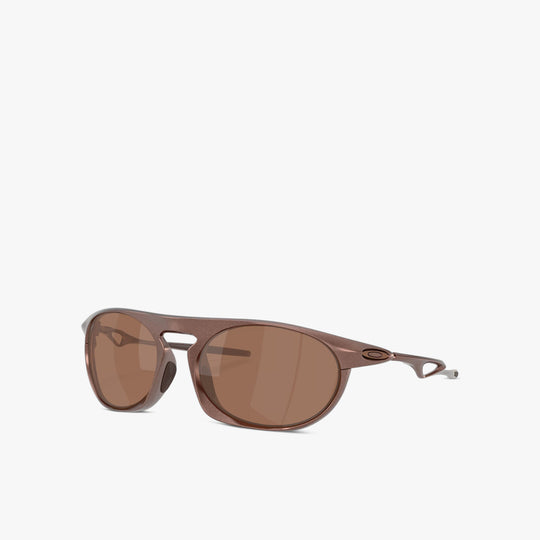 Oakley Neo Jacket sunglasses. Three-quarter view of matte mahogany sunglasses showing curved brown frame and temple arms.