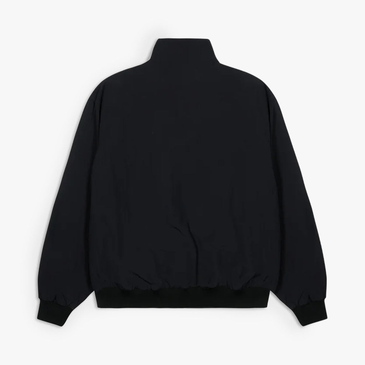 Patta Racing Team Track Jacket. Flat lay back view showing the solid black full-zip track jacket with a high stand collar, clean unadorned back panel, long sleeves, ribbed cuffs, and ribbed waistband. 