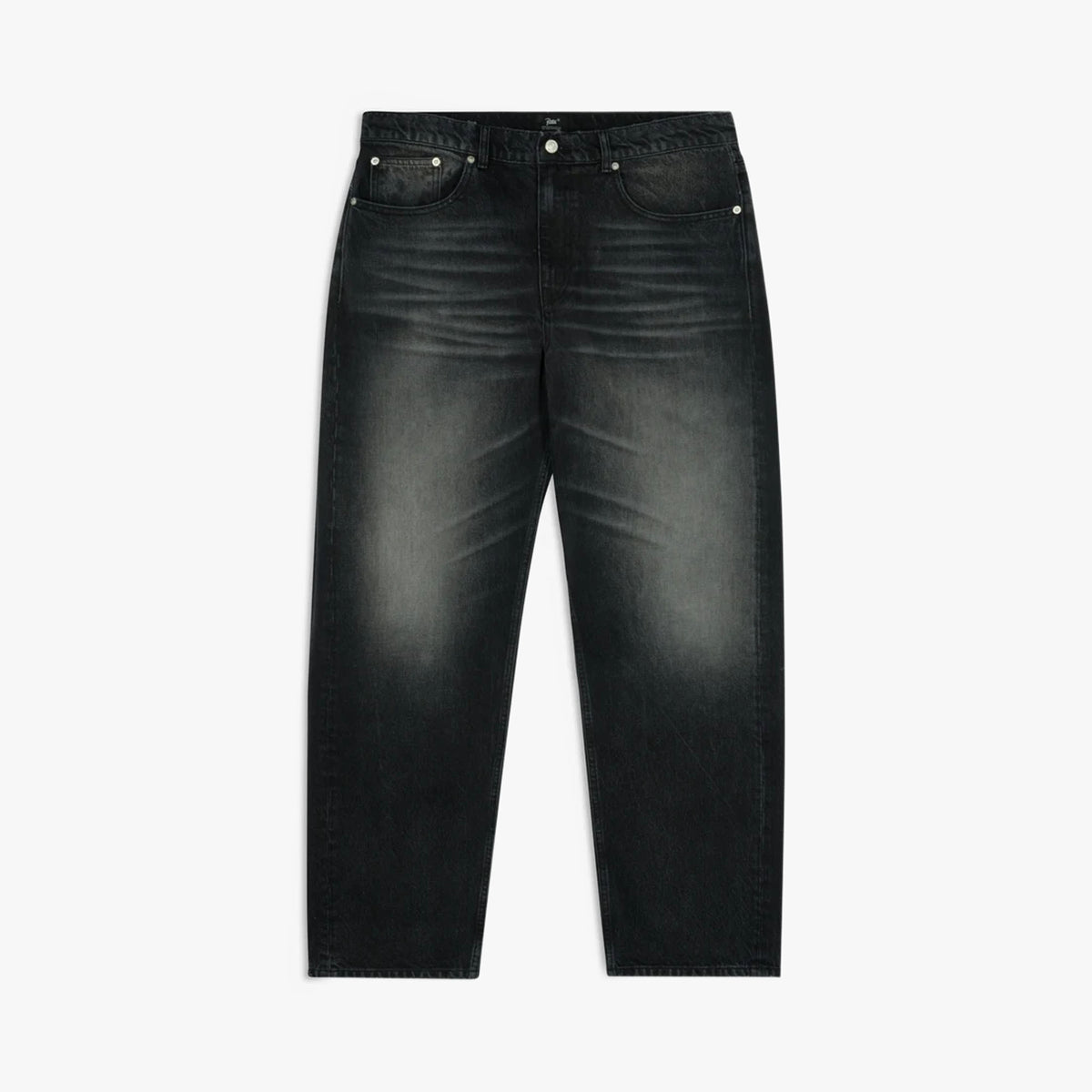Patta Dark Dirty Whiskers Baggy Denim Pants. Flat lay front view of black denim pants featuring a relaxed baggy fit, heavy whiskering wash along the lap and thighs, classic five-pocket construction, silver-tone rivets, belt loops, button closure, and wide straight legs. 